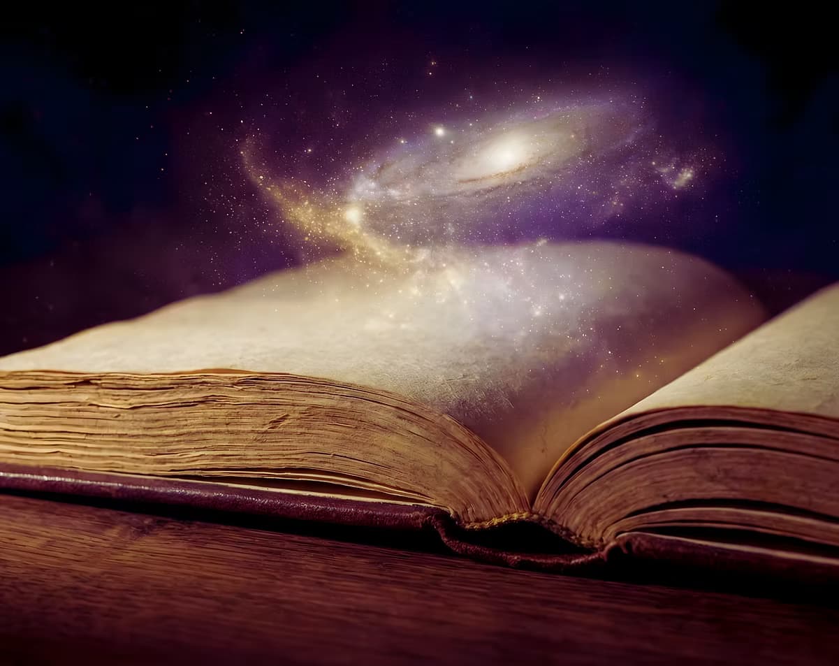 La vía láctea sobre un libro abierto — Editorial Microcosmos